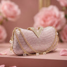 Milli legacy Elegant Wave Pattern Shimmer Clutch