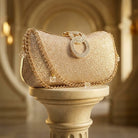 Milli Legacy Shimmering Evening Clutch With Interlocking Crystal Rings