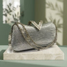 Milli legacy Elegant Wave Pattern Shimmer Clutch